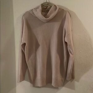 Cozy Cream 100% Cashmere Turtleneck Sweater with removable turtleneck feature.